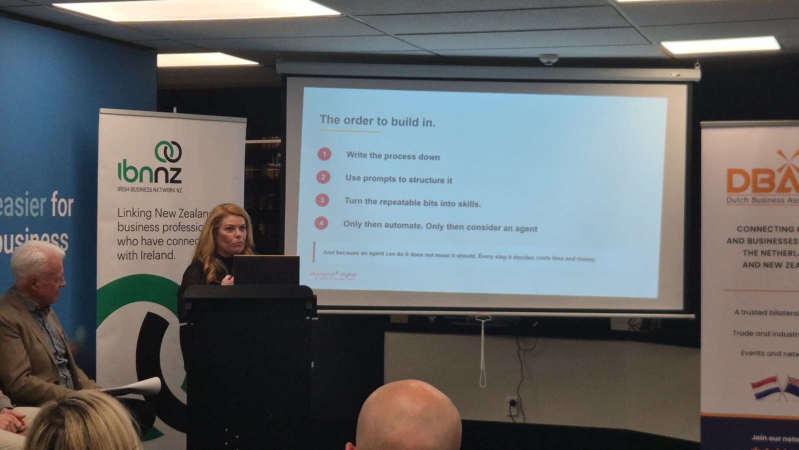 Lisa Byrnes presenting a slide titled The order to build in