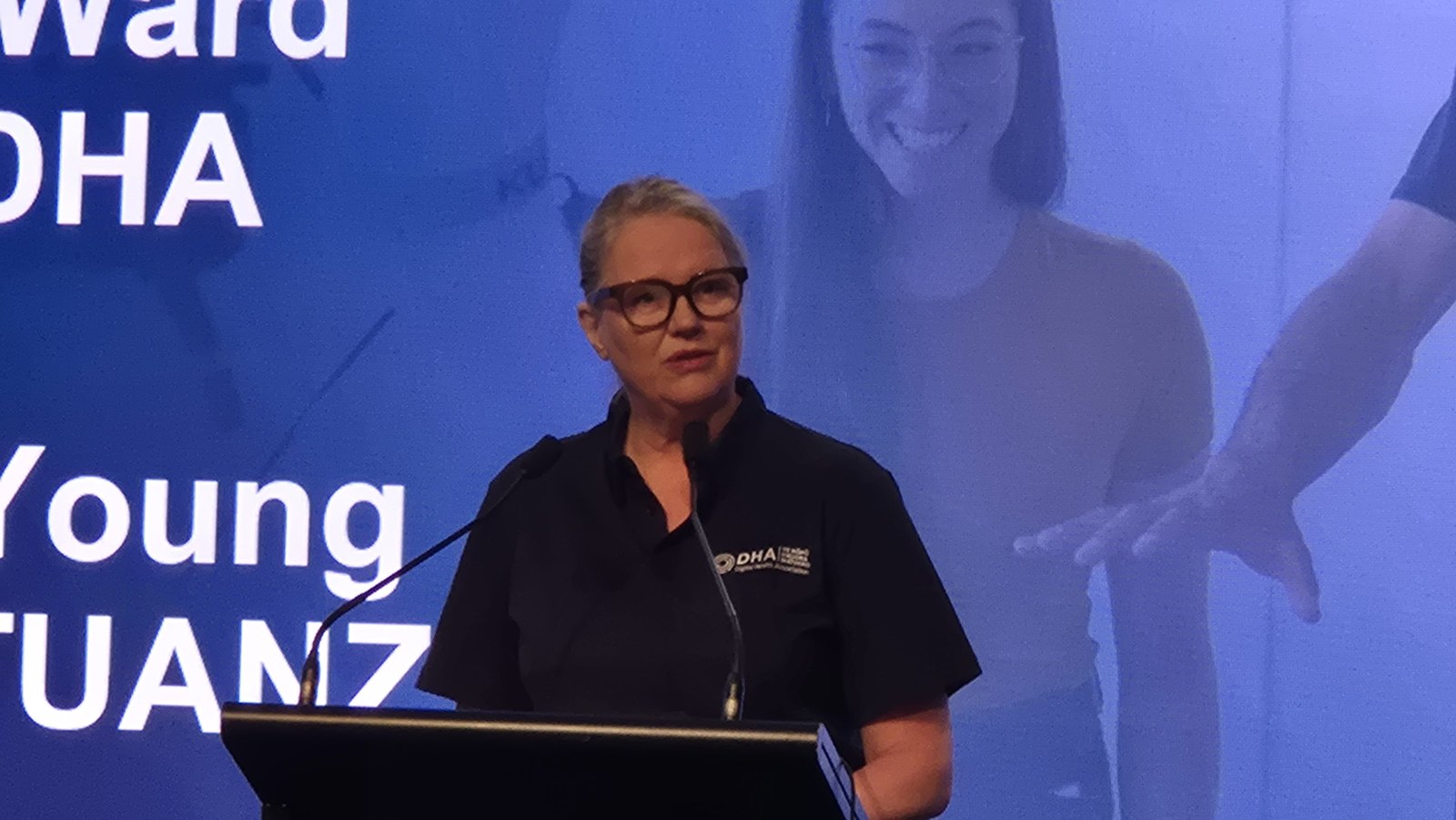Stella Ward, Chief Executive of the Digital Health Association, speaking at the lectern