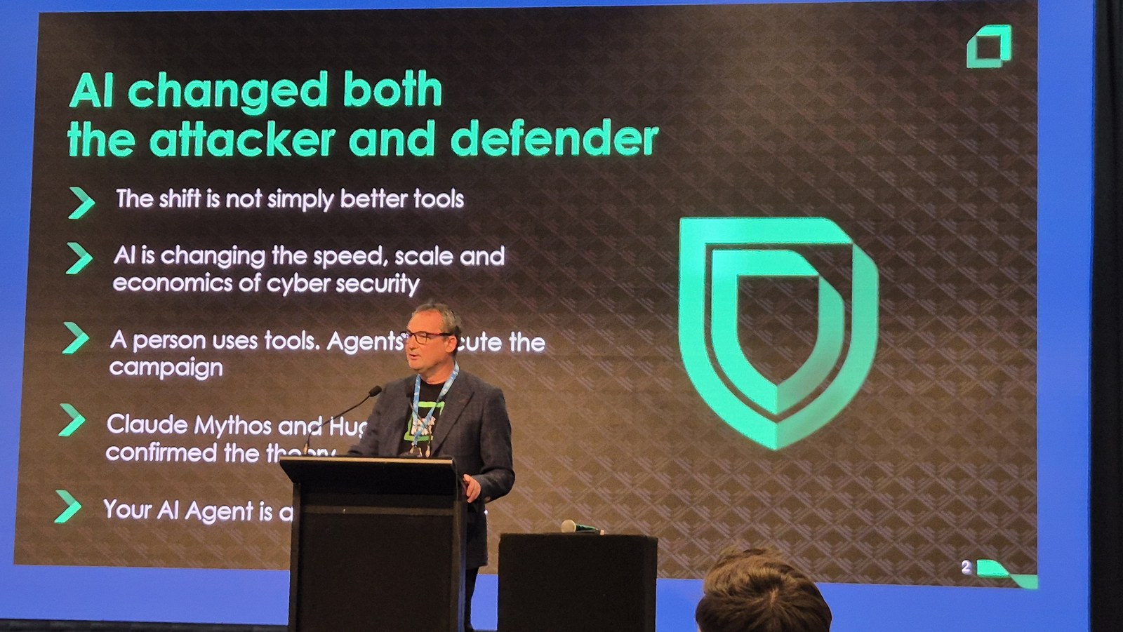 Slide headed AI changed both the attacker and defender, with bullets noting the shift is not simply better tools and that a person uses tools while agents execute the campaign