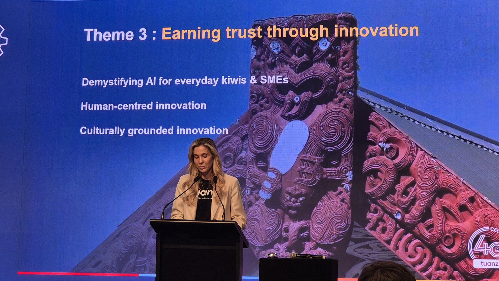 Slide headed Theme 3: Earning trust through innovation, listing demystifying AI for everyday kiwis and SMEs, human-centred innovation, and culturally grounded innovation