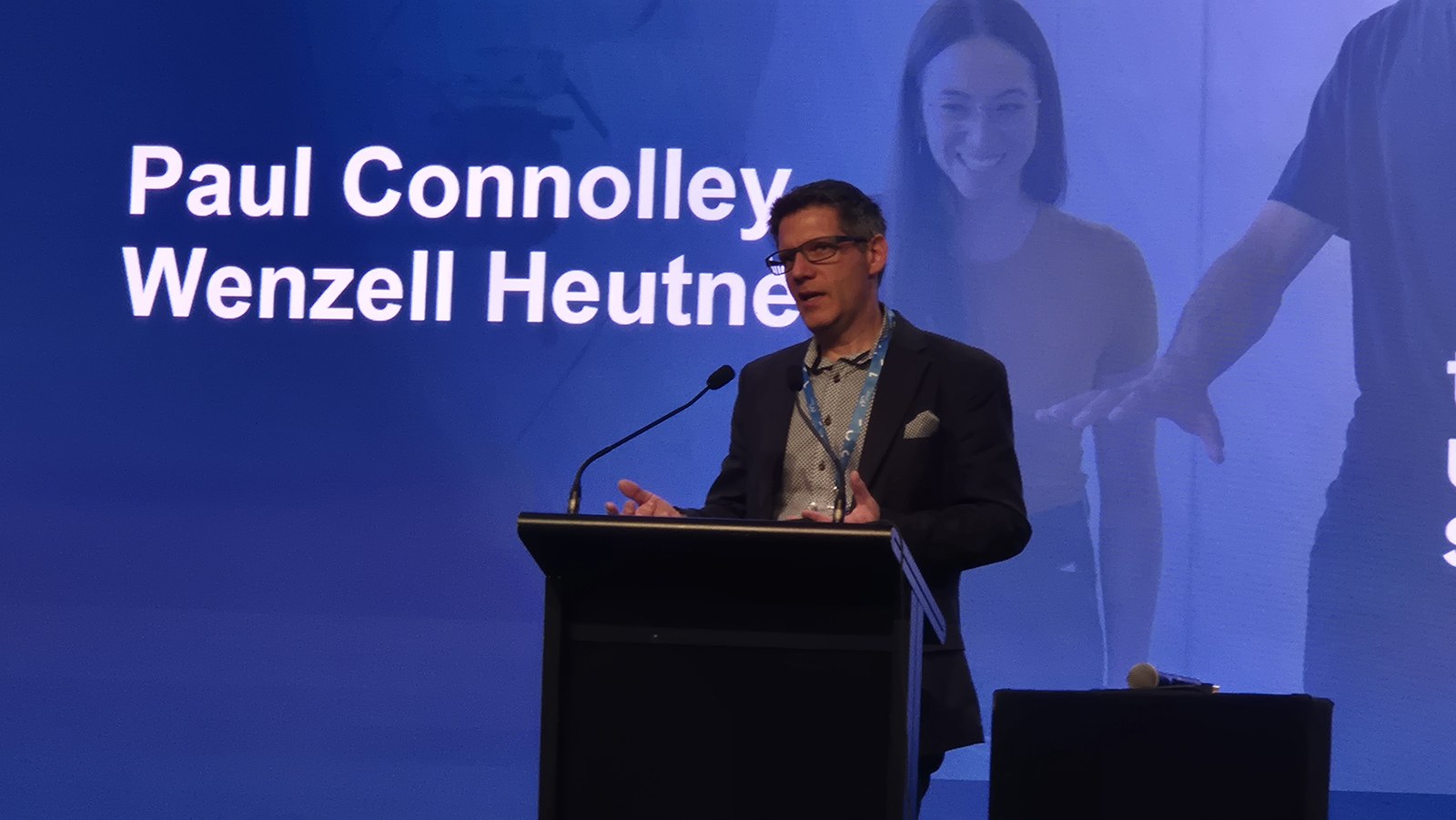 Wenzel Huettner speaking at the lectern during the Trust and Safety session at the Tech Users Summit